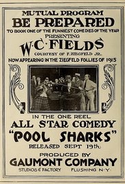 Pool Sharks poster with W.C. Fields sitting on pool table surrounded by a crowd of people.