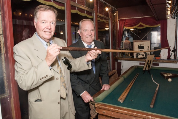 Allen and Ron standig next to pool table.